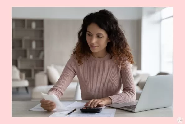A woman doing her expense report when working from home