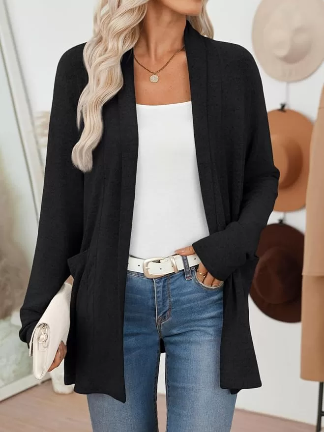 Cardigan sweater over a white shell will a simple necklace